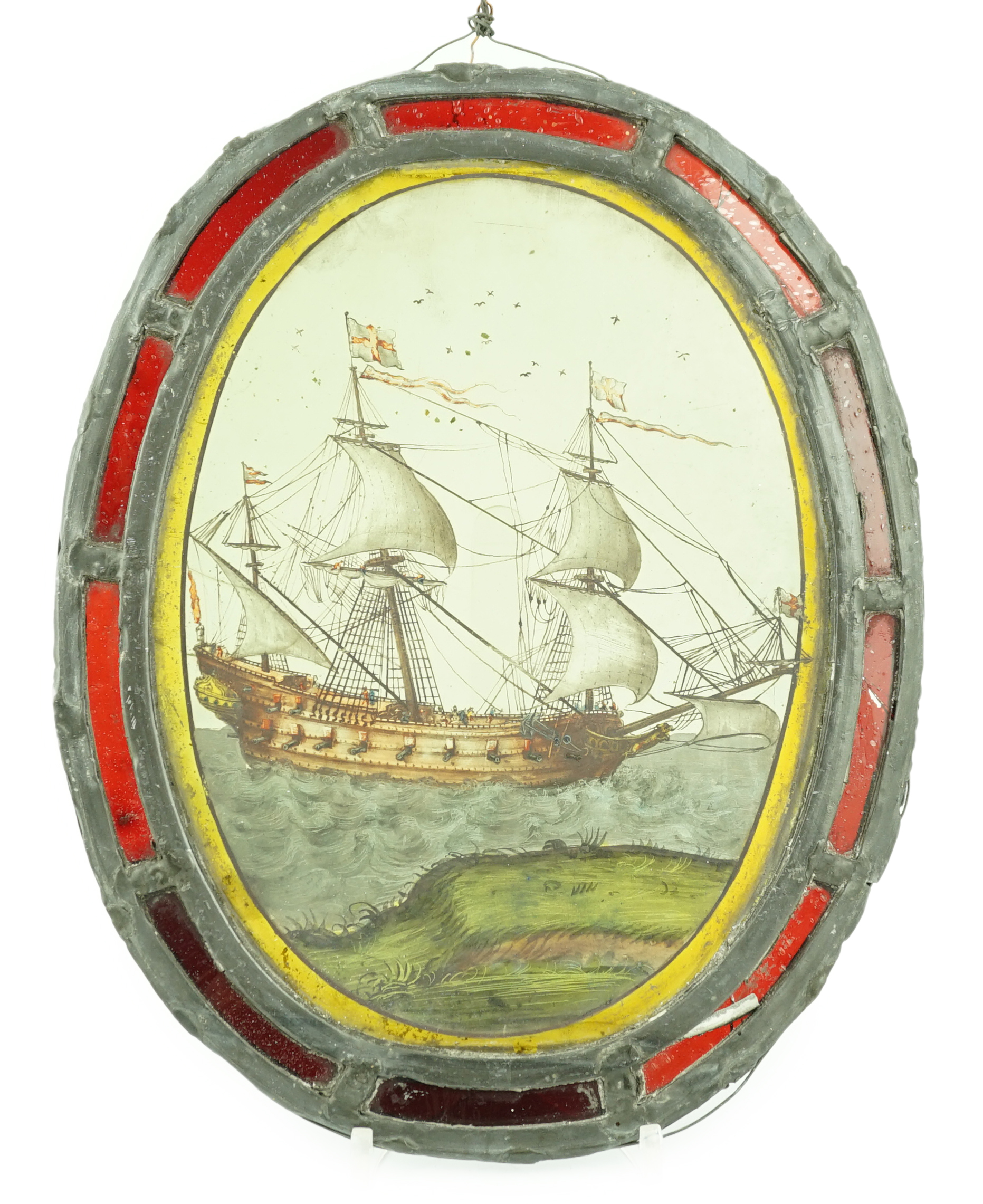 An early 18th century stained glass panel, overall 30 x 24cm